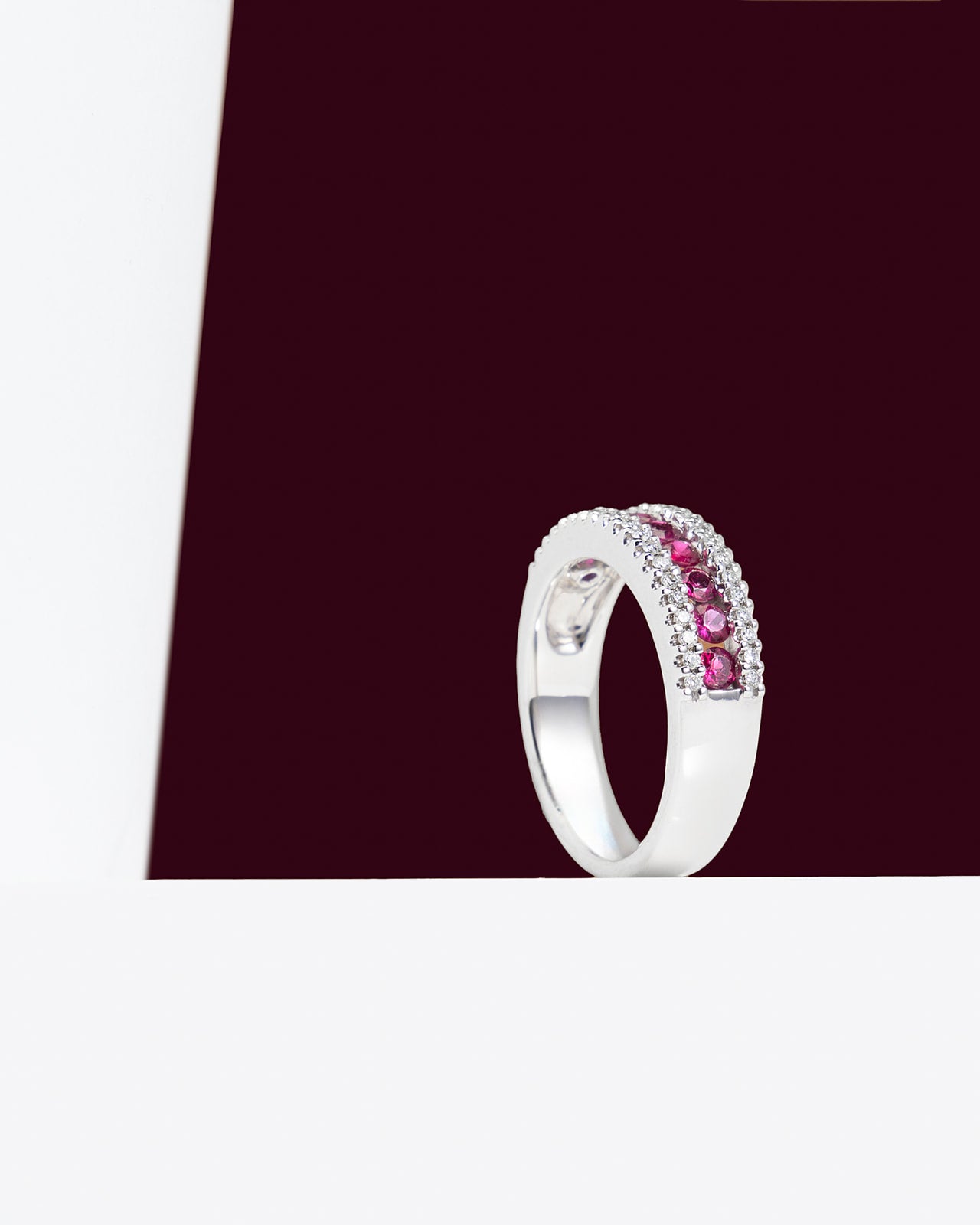 Nine Ruby and Diamond Ring in White Gold