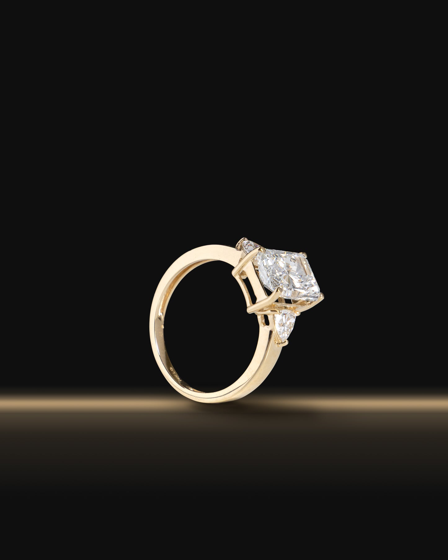 Center Emerald Diamond Ring in Yellow Gold