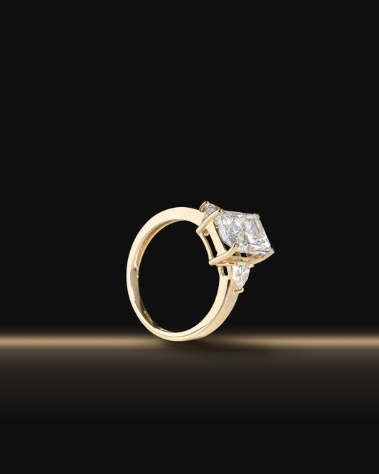Center Emerald Diamond Ring in Yellow Gold