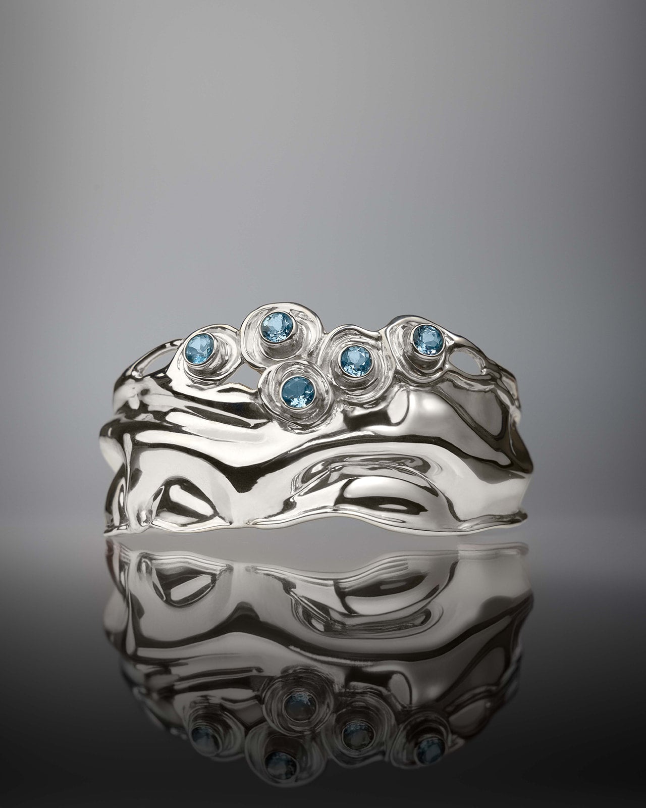 Ocean Waves Blue Topaz Cuff in Sterling Silver