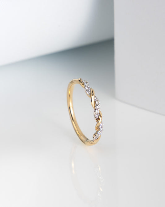 Ten Diamond Twist Band in Yellow and White Gold