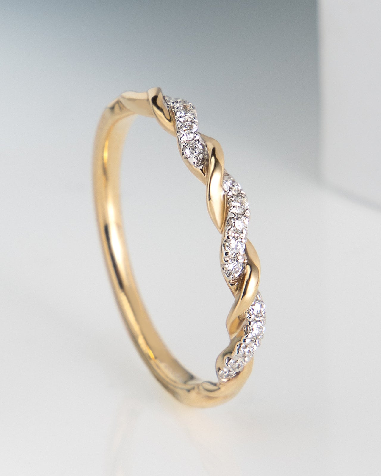 Ten Diamond Twist Band in Yellow and White Gold