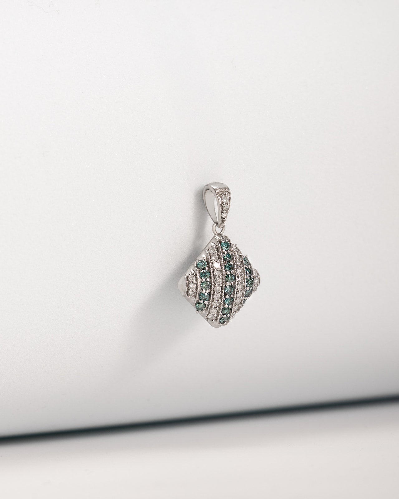 Blue & White Diamonds Pillow Pendant in White Gold