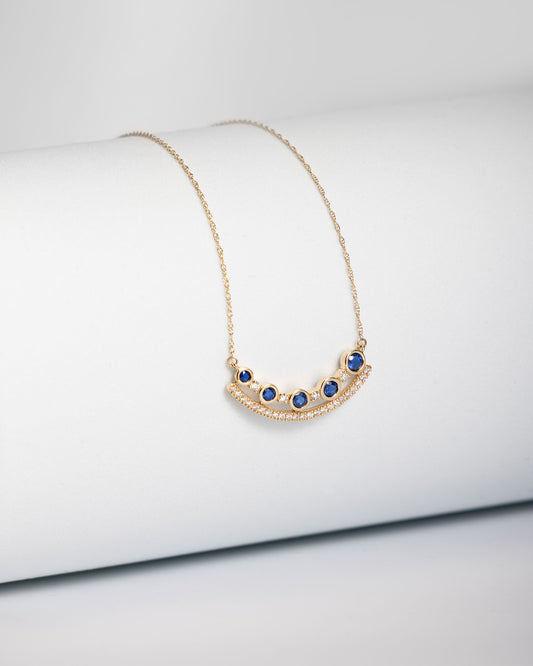 Sapphire & Diamond Swoop Pendant in Yellow Gold