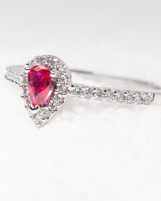 Pear Cut Ruby and Diamond Halo Ring in White Gold