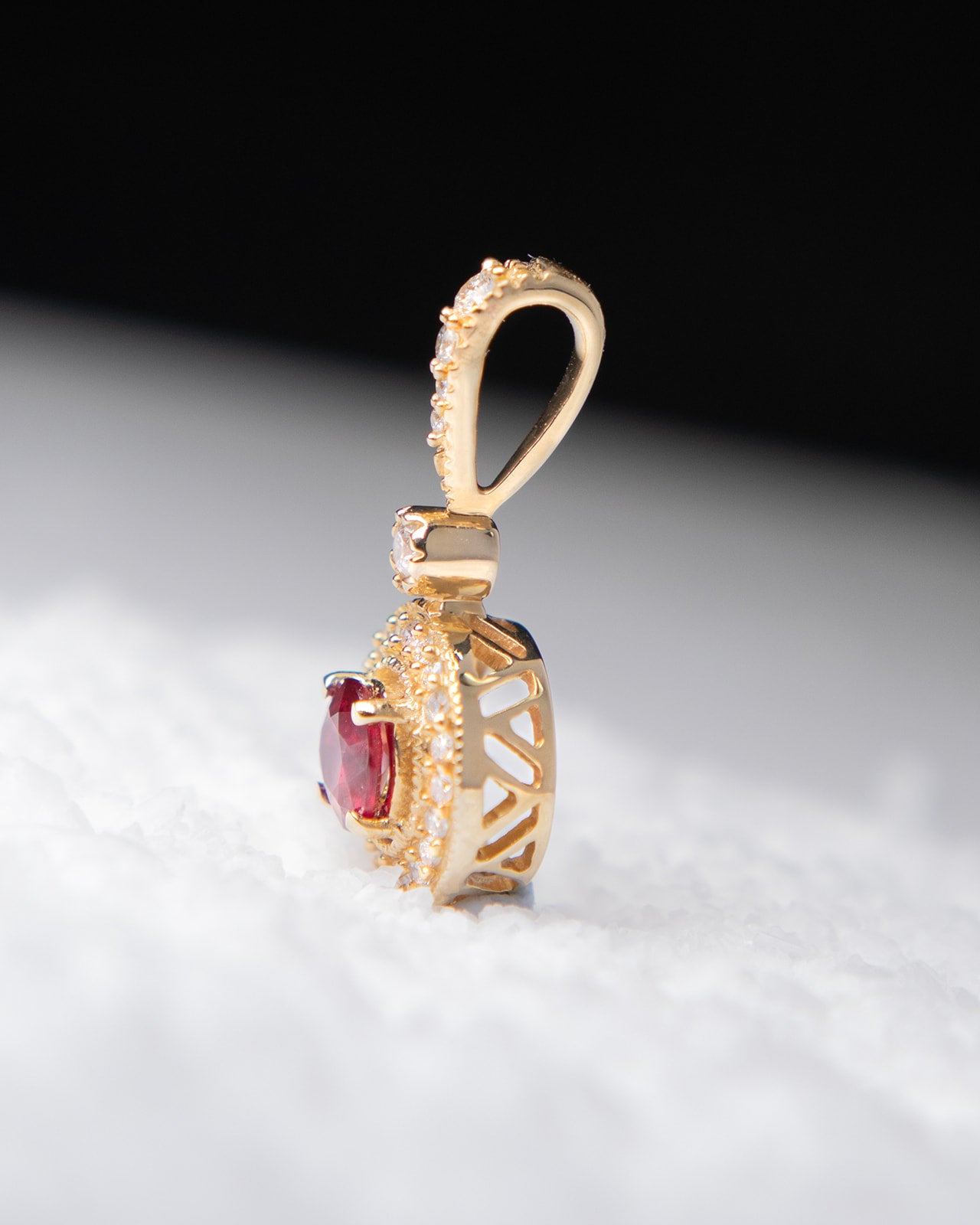 Ruby & Diamond Halo Pendant in Yellow Gold