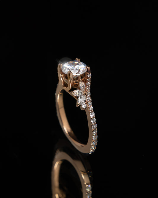 Oval and Round Diamond Ring in Rose Gold