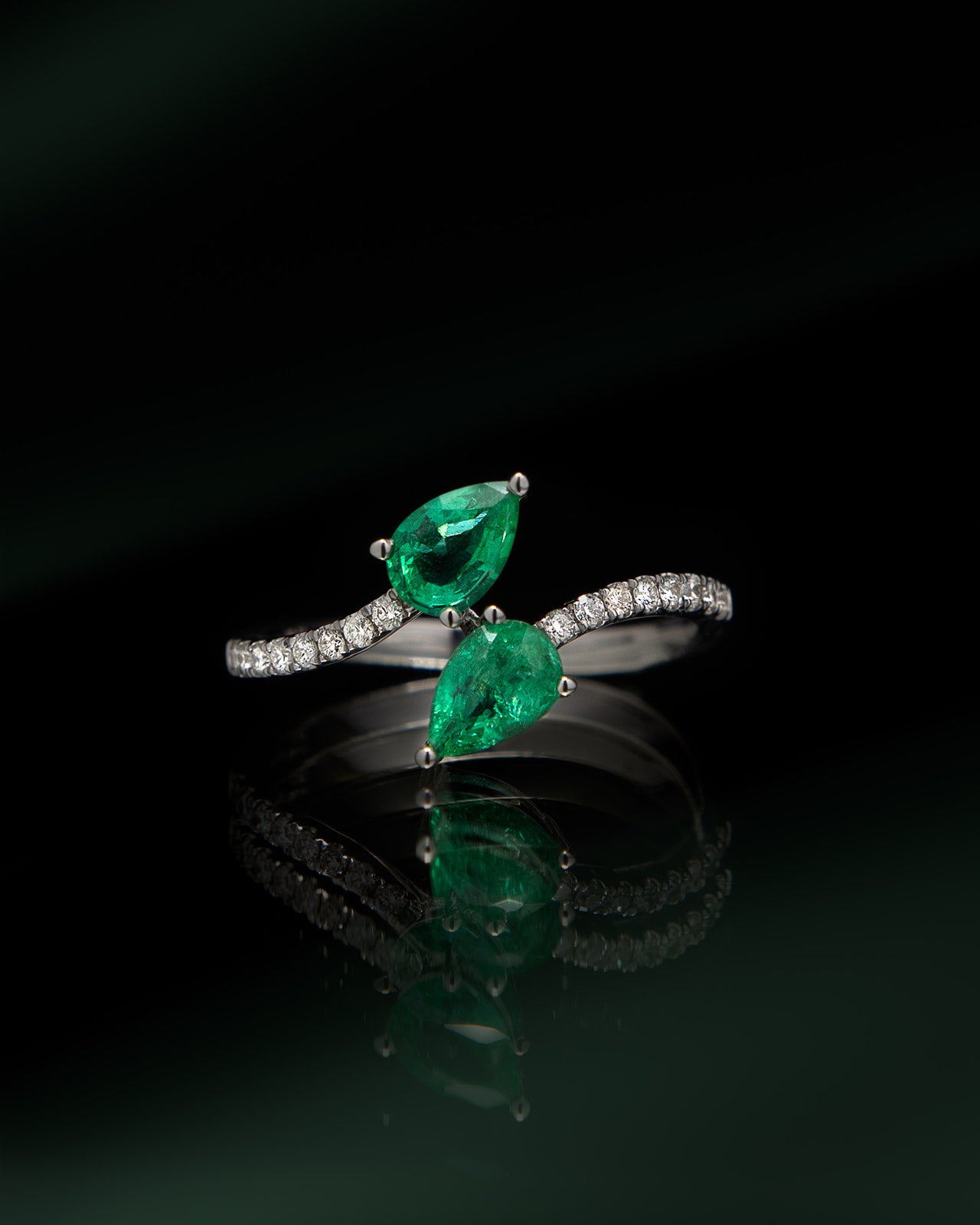Emerald and Diamond Bypass Ring in White Gold