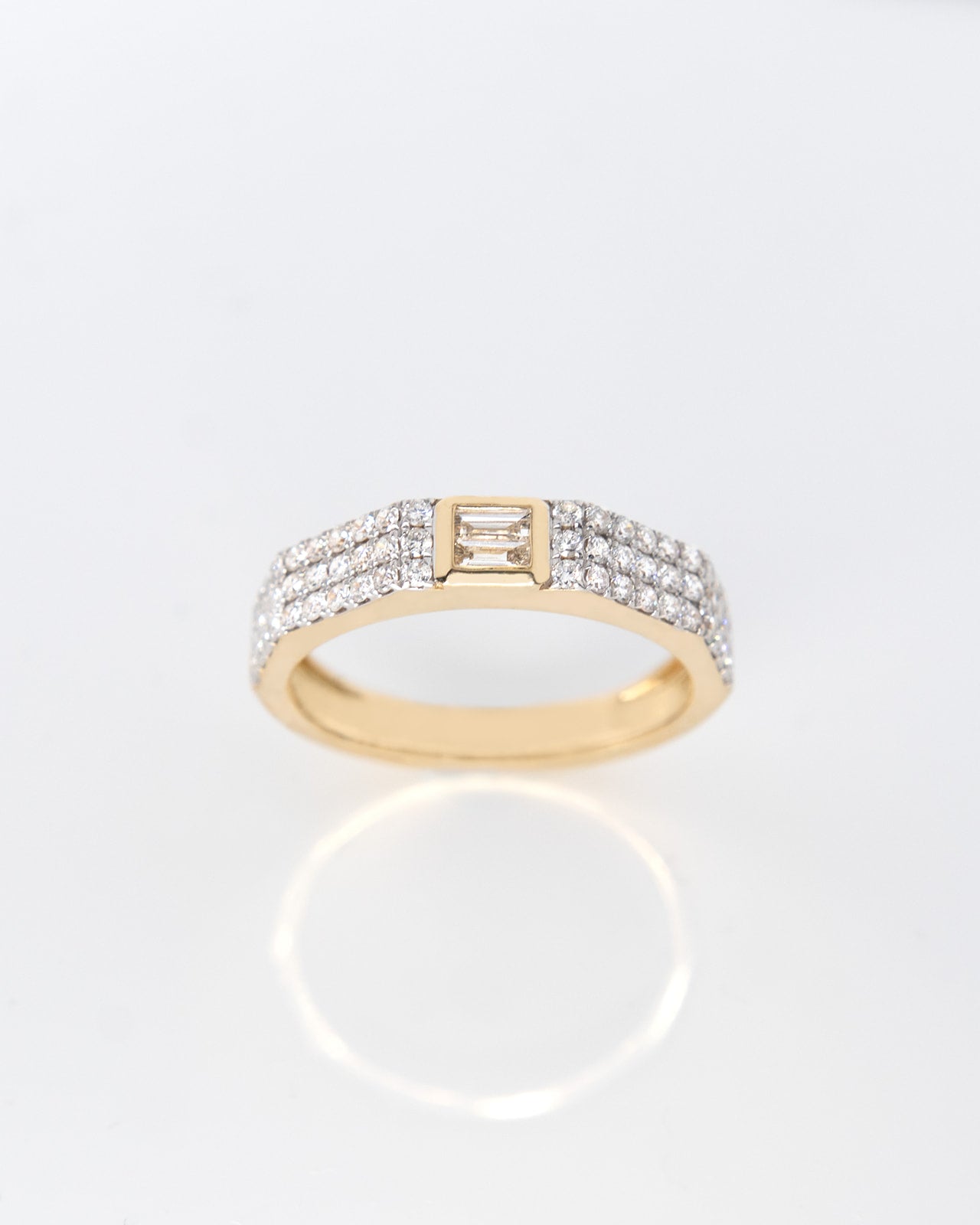 Baguette Center Diamond Ring in Yellow Gold