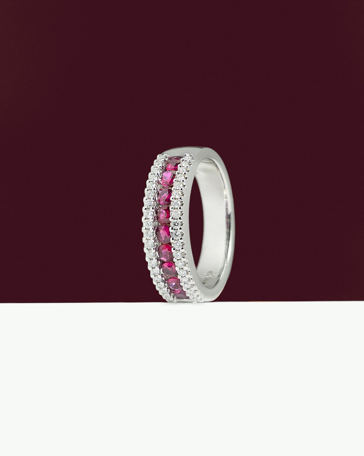 Nine Ruby and Diamond Ring in White Gold