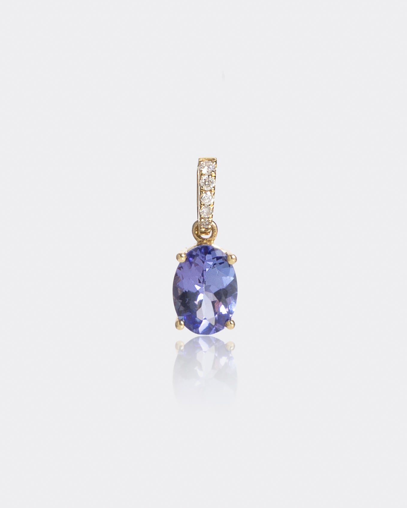 Oval Tanzanite & Diamond Pendant in Yellow Gold