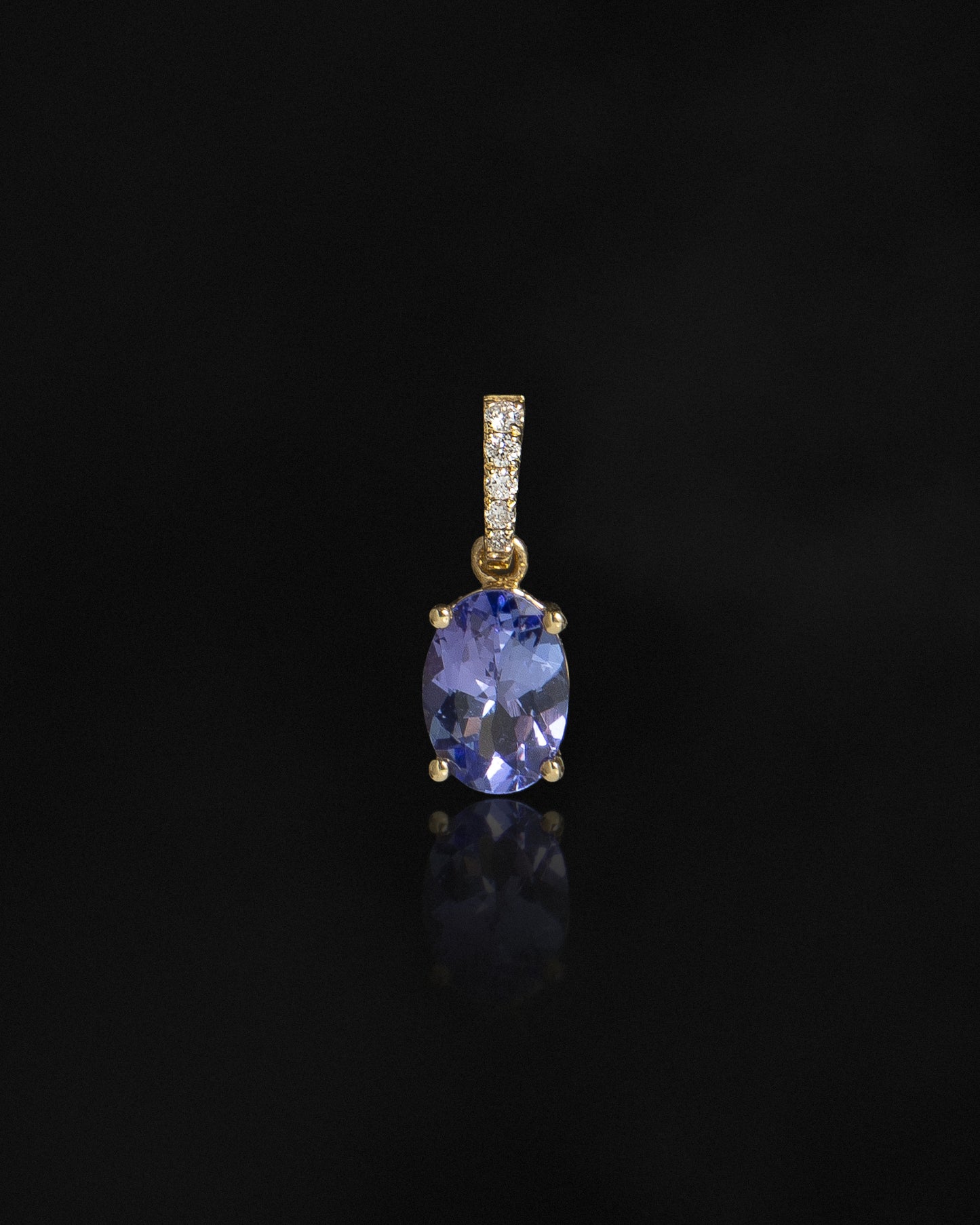 Oval Tanzanite & Diamond Pendant in Yellow Gold