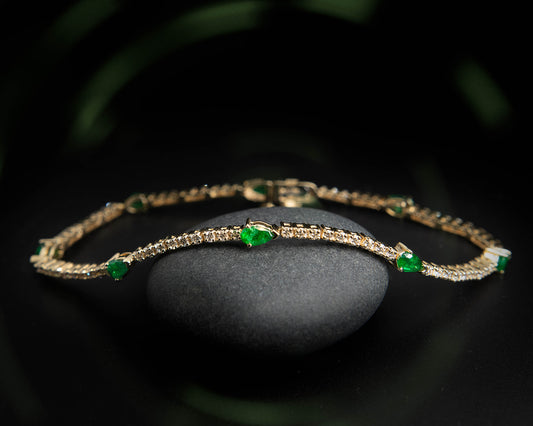 Pear Emeralds & Diamonds Tennis Bracelet in Yellow Gold