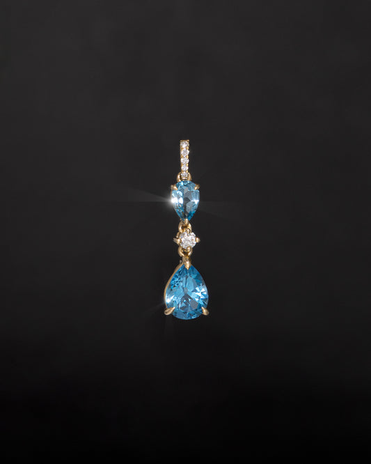 Blue Pear Topaz & Diamonds Pendant in Yellow Gold