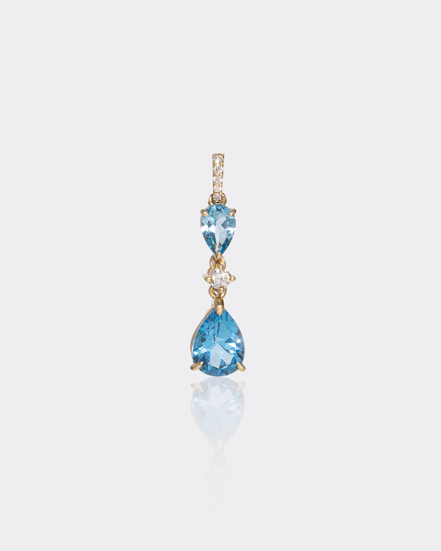 Blue Pear Topaz & Diamonds Pendant in Yellow Gold