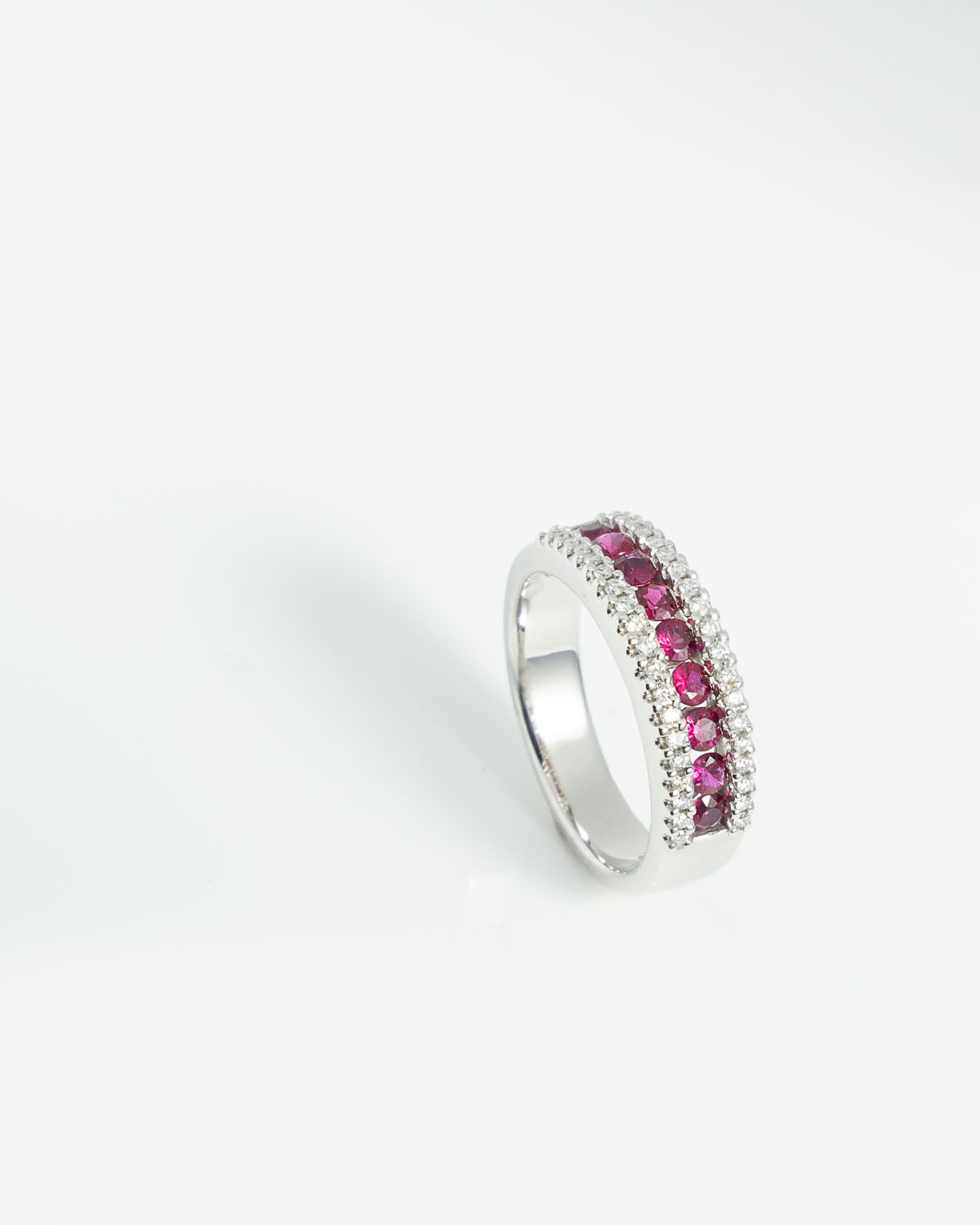 Nine Ruby and Diamond Ring in White Gold