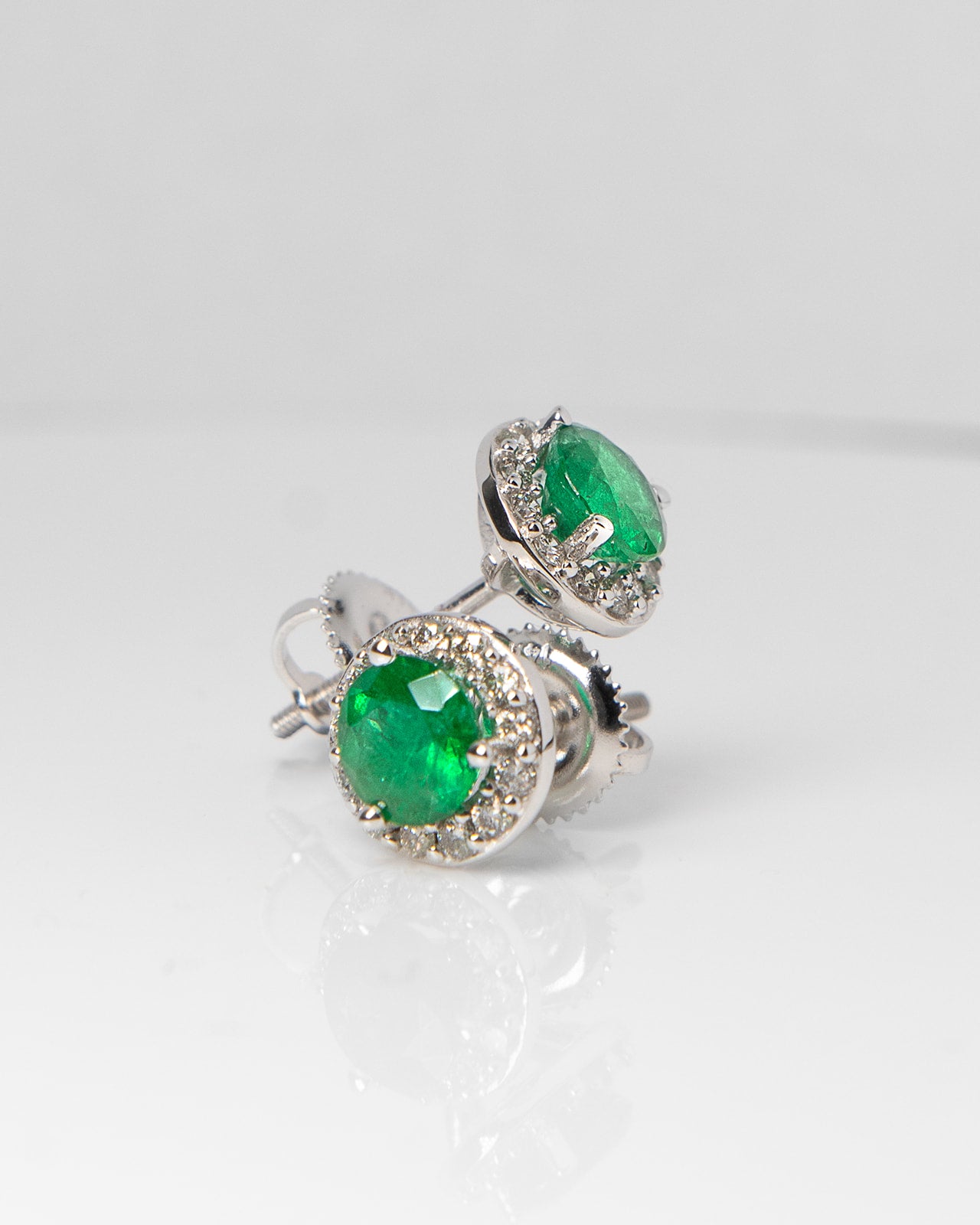 Emerald & Diamond Cluster Earrings in White Gold