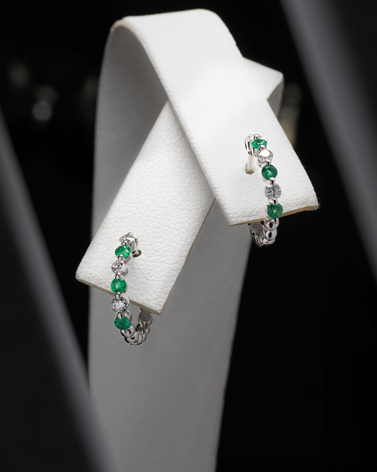 Emerald & Diamonds Huggie Hoops in White Gold